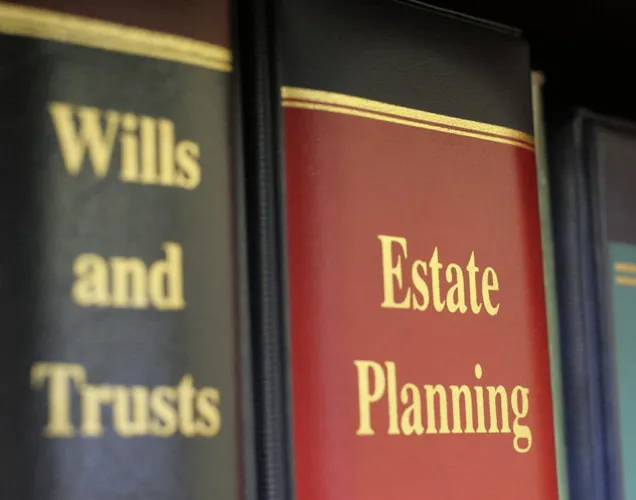 Law books titled Wills and Trusts and Estate Planning